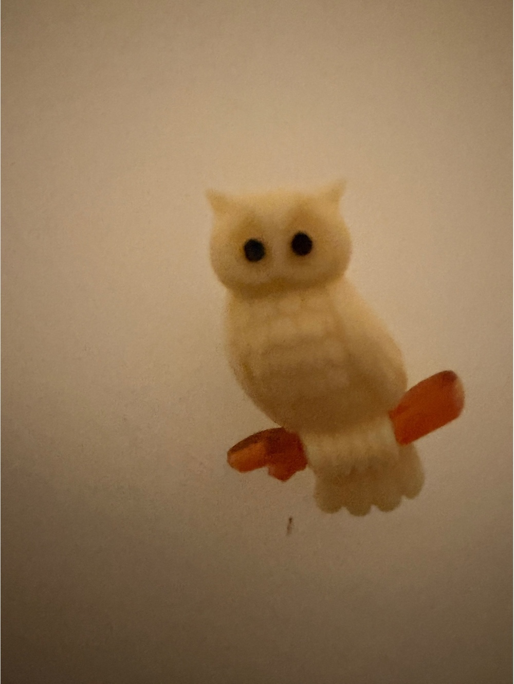 White owl on branch brooch